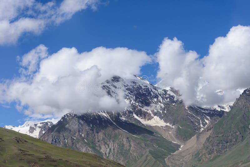 Jammu Kashmir Landscape With Snow Peaksgreen Valley And Blue Cloudy