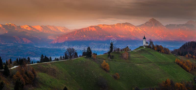 Jamnik, Slovenia - Beautiful golden sunset at Jamnik St. Primoz church royalty free stock photography Jamnik, Slovenia - Beautiful golden sunset at Jamnik St. Primoz church royalty free stock photography