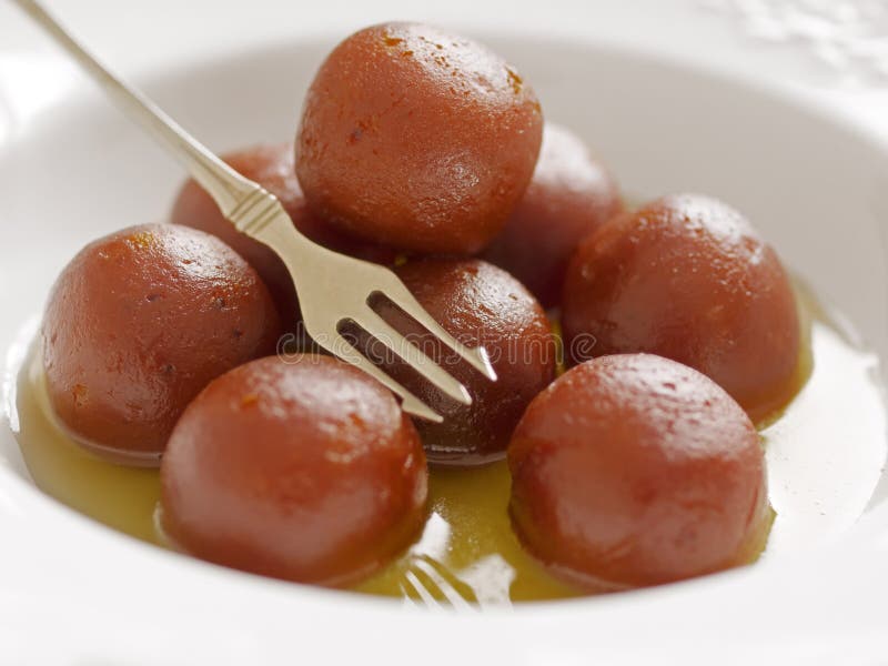 Jamun indio del gulab del postre imagen de archivo libre de regalías Jamun indio del gulab del postre imagen de archivo libre de regalías