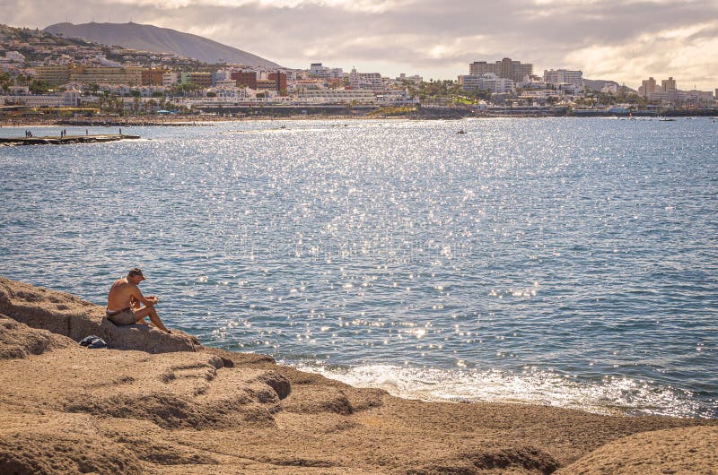 January 2015, people on the beach at Casas de Duque, Adeje. Tenerife. Spain. January 2015, people on the beach at Casas de Duque, Adeje. Tenerife. Spain