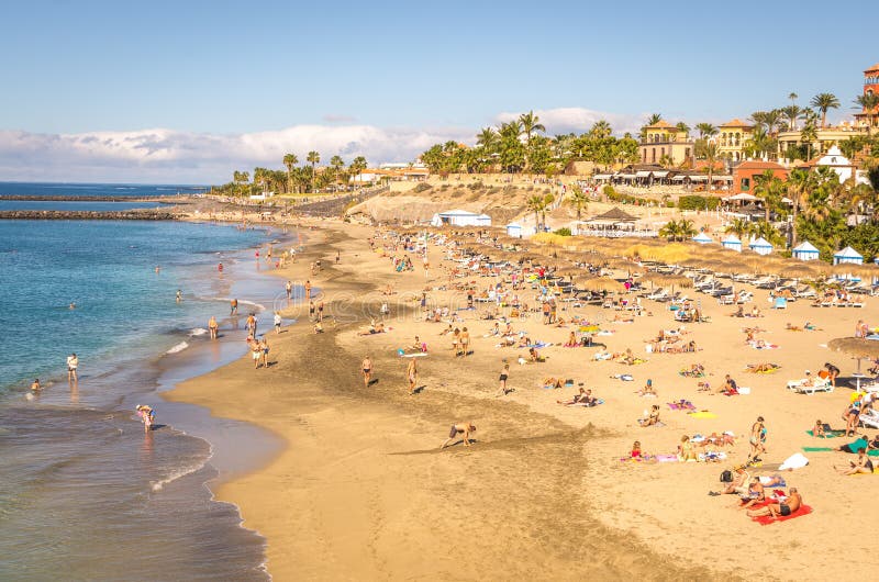 January 2015, people on the beach at Casas de Duque, Adeje. Tenerife. Spain. January 2015, people on the beach at Casas de Duque, Adeje. Tenerife. Spain