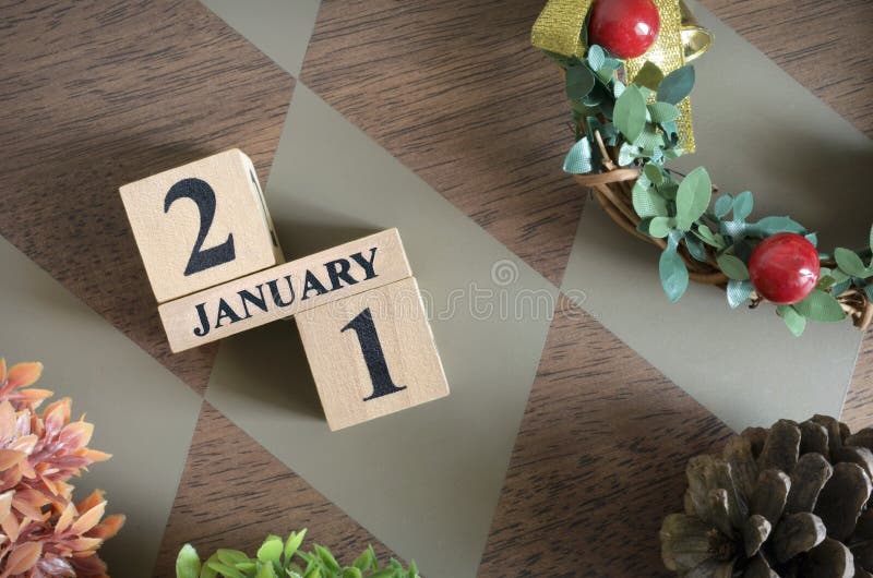 January 21-julets datumutformning med nummerkub. January 21 julomeddelandedatum i naturligt koncept för en bakgrund.