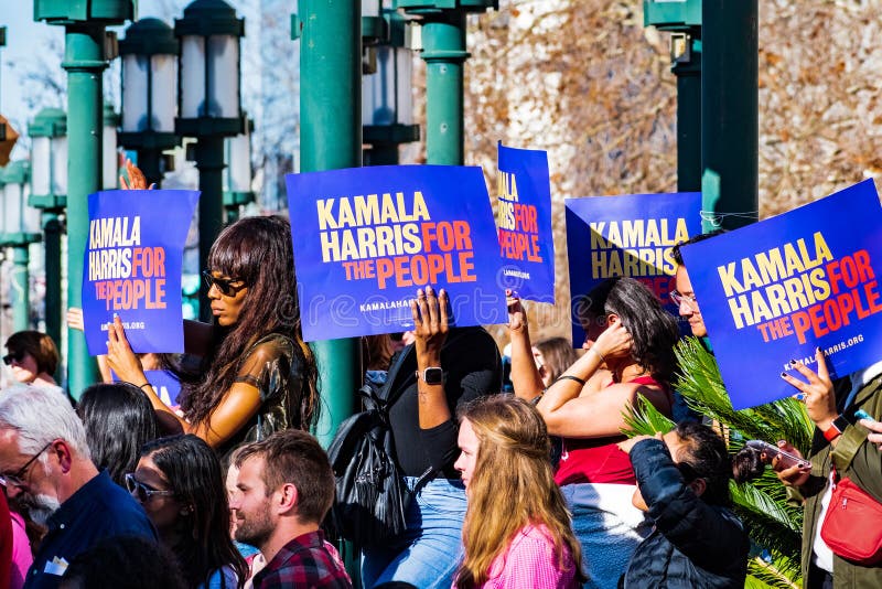 January 27, 2019 Oakland / CA / USA - Participants at the Kamala Harris for President Campaign Launch Rally holding `Kamala Harris for the people` signs