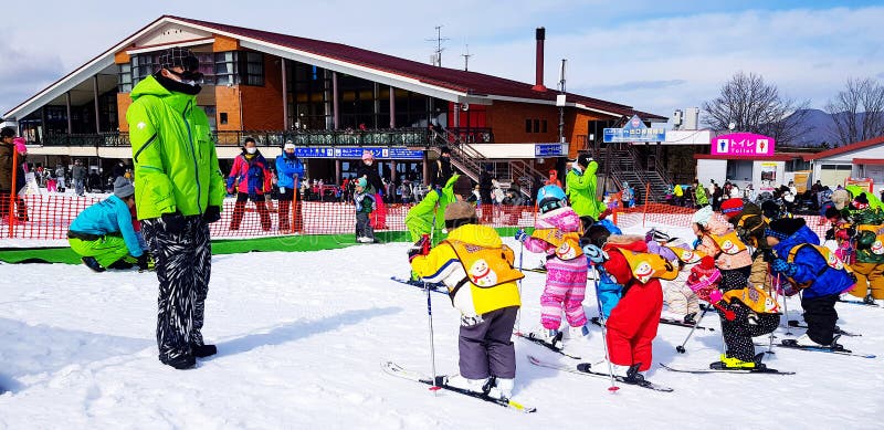 Many children learning and practice how to playing ski from staff or coach at jiten snow resort, Yamanashi, Japan.