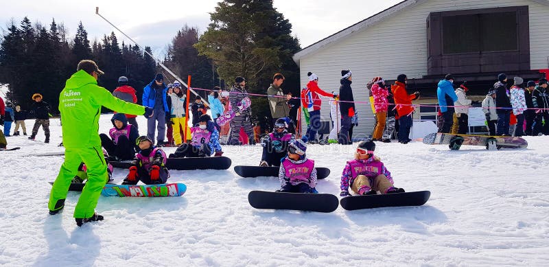 Many children learning and practice how to playing ski from staff or coach at jiten snow resort, Yamanashi, Japan.