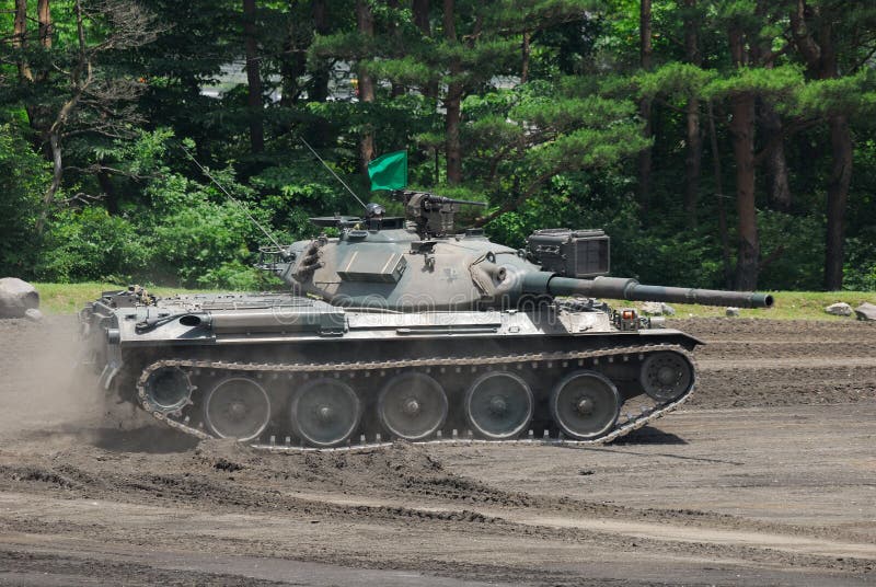 Shizuoka Prefecture, Japan - July 10, 2011: Japan Ground Self-Defense Force Mitsubishi Type 74 MBT (Main Battle Tank). Shizuoka Prefecture, Japan - July 10, 2011: Japan Ground Self-Defense Force Mitsubishi Type 74 MBT (Main Battle Tank).