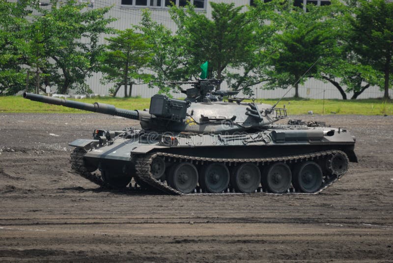 Shizuoka Prefecture, Japan - July 10, 2011: Japan Ground Self-Defense Force Mitsubishi Type 74 MBT (Main Battle Tank). Shizuoka Prefecture, Japan - July 10, 2011: Japan Ground Self-Defense Force Mitsubishi Type 74 MBT (Main Battle Tank).