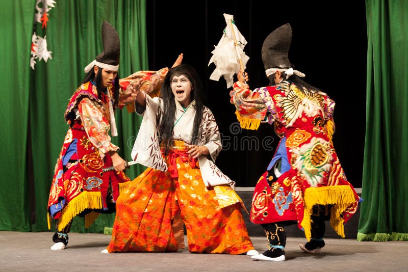 Japanese actors performing samurai play