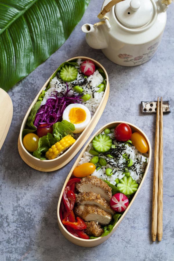 Japanese bento box with chicken, vegetables and rice