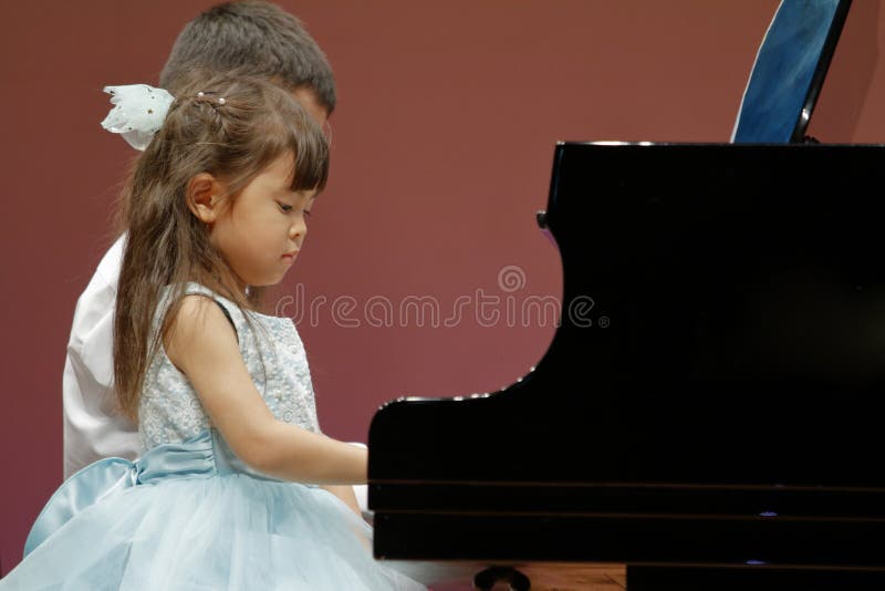 Sister play piano