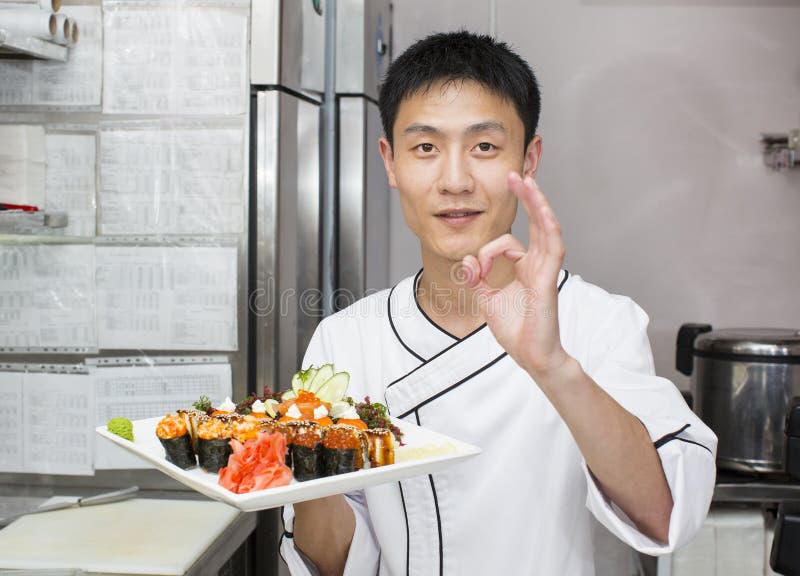 Plate of Japanese Sushi stock image. Image of chopsticks 23552529