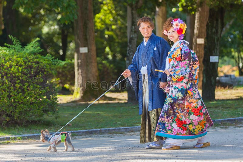 Japanese couple in traditional wedding dresses