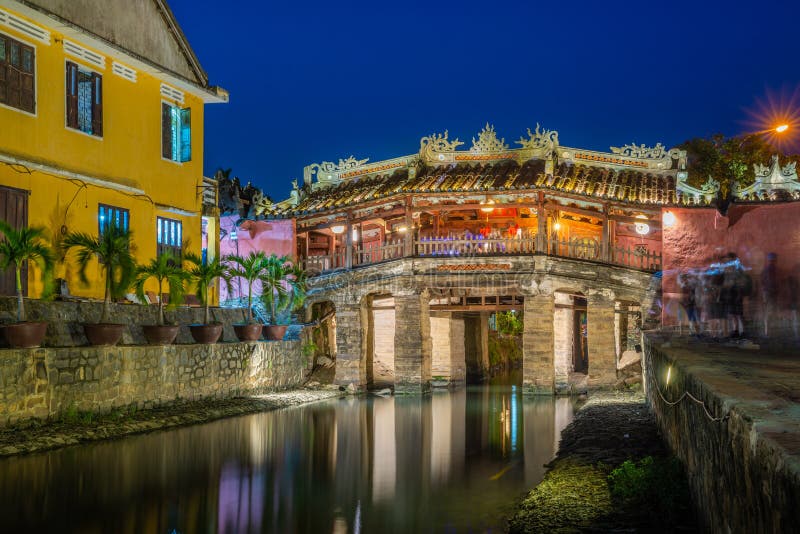 Japanese Covered ancient Bridge and River in Street in Old city of Hoi An in Southeast Asia in Vietnam. Vietnamese heritage and
