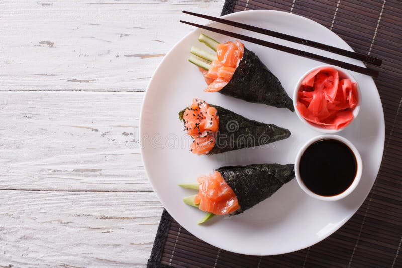 Japanese food: Salmon temaki, ginger and sauce. Horizontal top v stock photo Japanese food: Salmon temaki, ginger and sauce. Horizontal top v stock photo