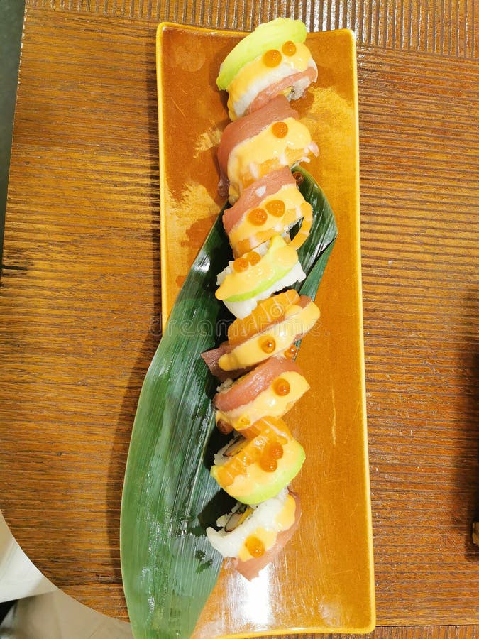 The Japanese Fresh Fish Salmon and Avocado in Sushi Roll Stock Photo Image of sushi, roll