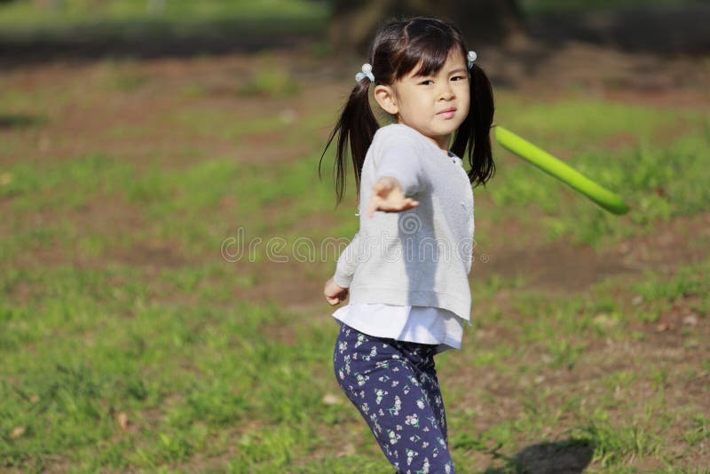 Japanese Girl Playing Flying Disc Stock Image Image of child, outside