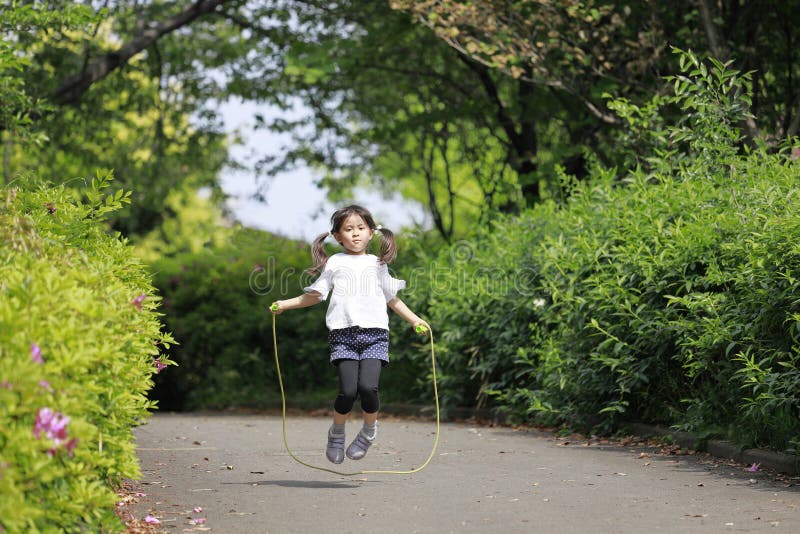 Japanese girl 5 years old playing with jump rope. Japanese girl 5 years old playing with jump rope