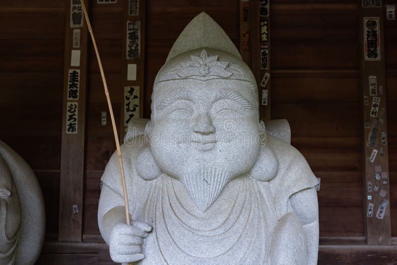 A Japanese guardian statue at the traditional street in Tokyo