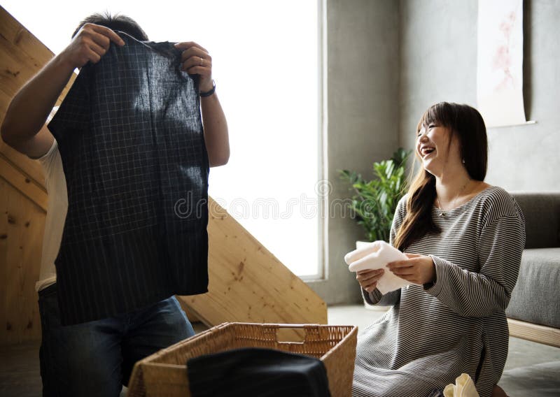 Japanese husband and wife in living room stock photo Japanese husband and wife in living room stock photo