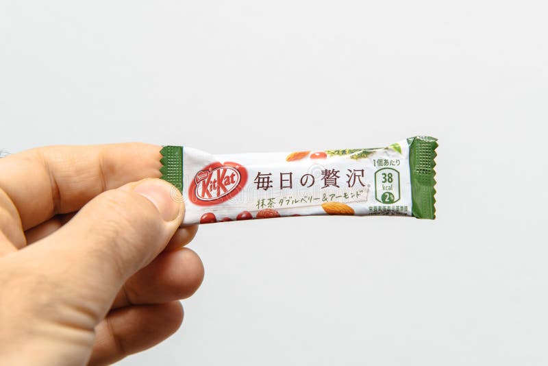 Japanese Kit Kat Cookie Chocolate Nestle in Male Hand Editorial Stock Photo  - Image of splitting, biscuit: 116884883
