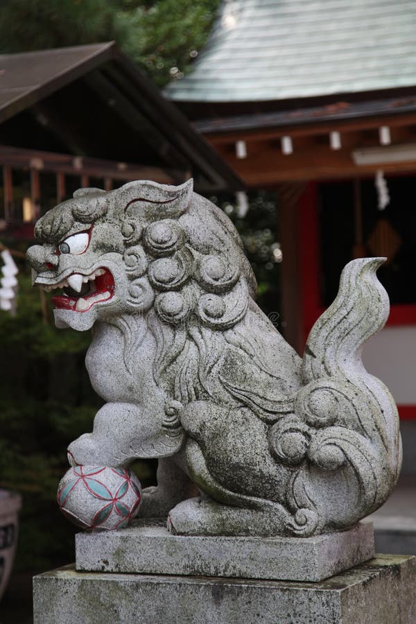 Japanese Lion Dog Statue within Cherry Blossoms Stock Photo Image of