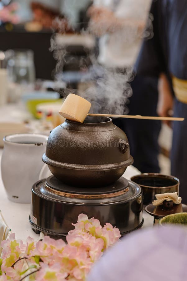Japanese Men Preparing Green Tea during a Demonstration. Japanese Tea