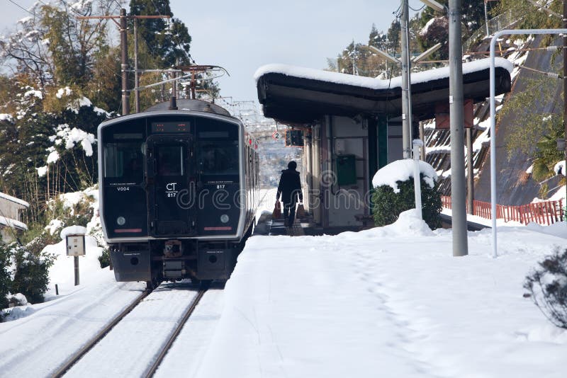 Japanese Passenger Train At Station On A Snowy Day Editorial Stock