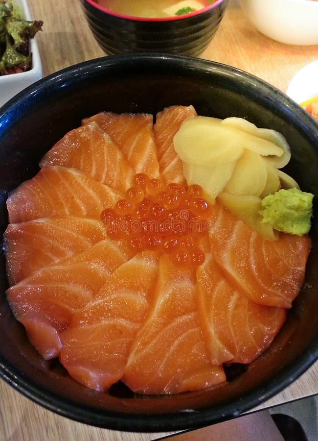 Japanese Rice with Salmon and Tobiko Salmon Don served with Wasabi and Prickled Ginger with Miso Soup, Salmon roe bowl. stock photos Japanese Rice with Salmon and Tobiko Salmon Don served with Wasabi and Prickled Ginger with Miso Soup, Salmon roe bowl. stock photos