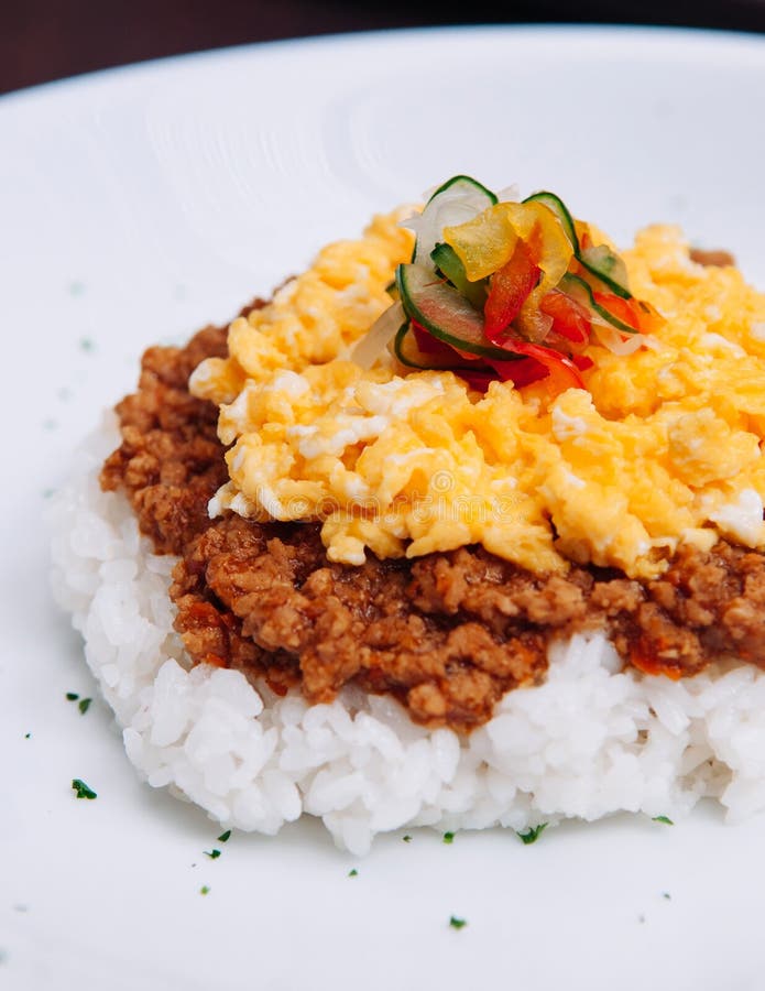 Japanese Spicy Tan Tan Pork Over Rice with Scramble Egg Stock Image