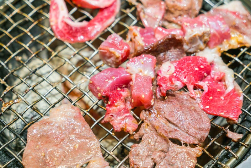 Japanese Style Raw Fresh Beef on Hot Barbecue Grill . Stock Image