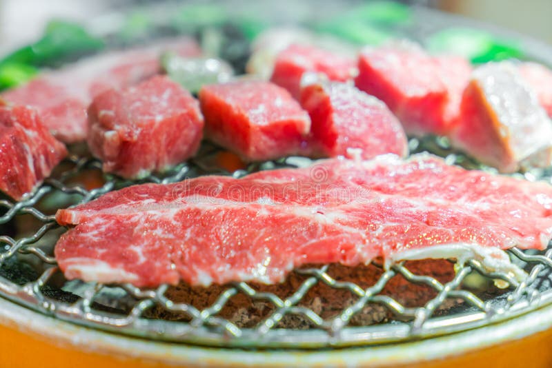 Japanese Style Raw Fresh Beef on Hot Barbecue Grill . Stock Image