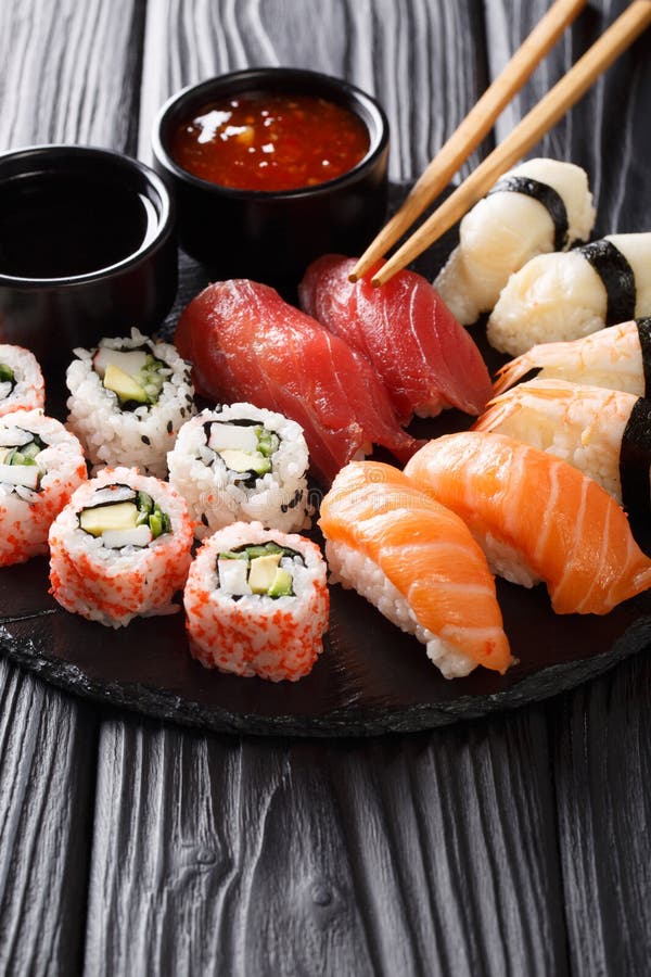 Japanese Sushi Food Served on Blackboard Plate. Sushi Roll with Prawn ...