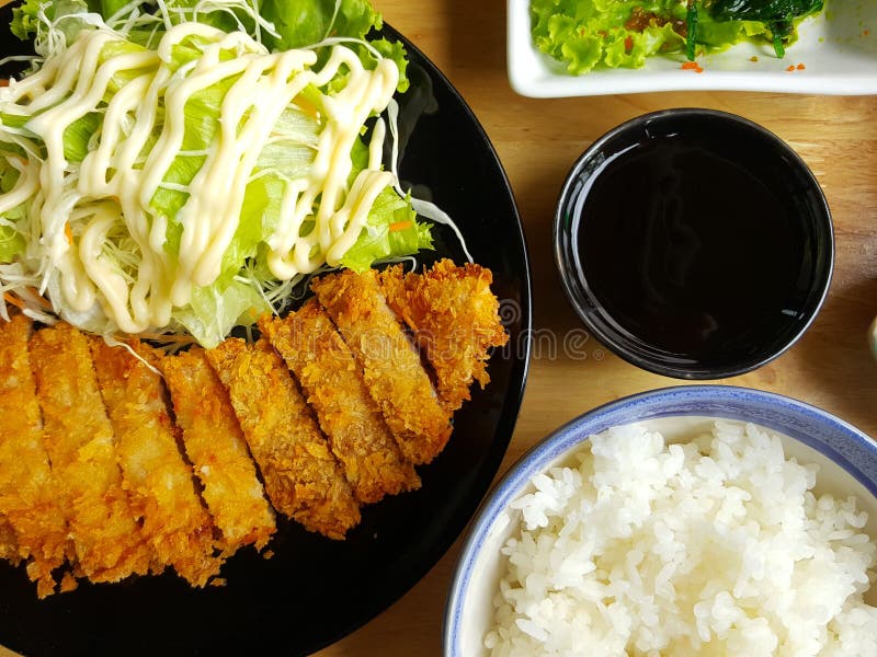Tonkatsu, Japanese Curry Rice With Deepfried Pork Cutlet On Woo Stock