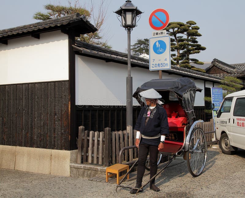 Japanische traditionelle Rikschaabziehvorrichtung lizenzfreies stockbild Japanische traditionelle Rikschaabziehvorrichtung lizenzfreies stockbild