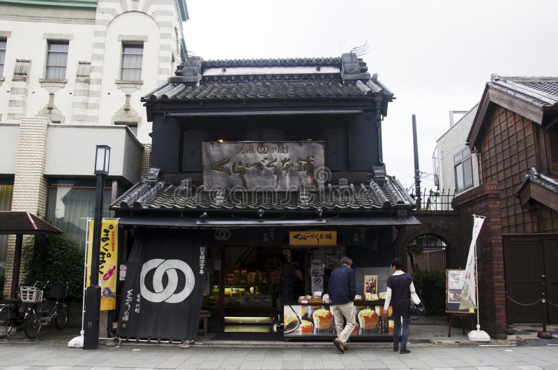 Japanse mensen en en vreemdelingsreiziger die souv lopen winkelen royalty-vrije stock afbeelding Japanse mensen en en vreemdelingsreiziger die souv lopen winkelen royalty-vrije stock afbeelding