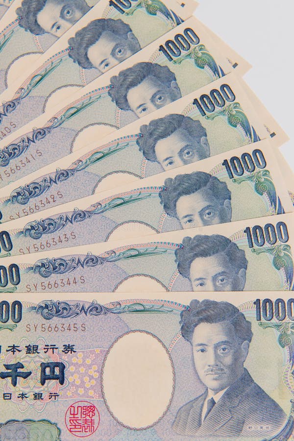 Japansk yen, yen 1000 på vit bakgrund, japansk valutayenbank royaltyfri bild Japansk yen, yen 1000 på vit bakgrund, japansk valutayenbank royaltyfri bild