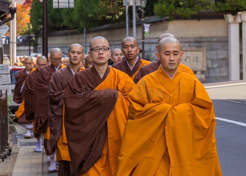 WAKAYAMA, JAPAN - OCTOBER 29: Japanese Monk in Wakayama, Japan on October 29, 2014. Unidentified group of japanese monks are on the way to thier temple in Koyasan (Mt. Koya) area. WAKAYAMA, JAPAN - OCTOBER 29: Japanese Monk in Wakayama, Japan on October 29, 2014. Unidentified group of japanese monks are on the way to thier temple in Koyasan (Mt. Koya) area