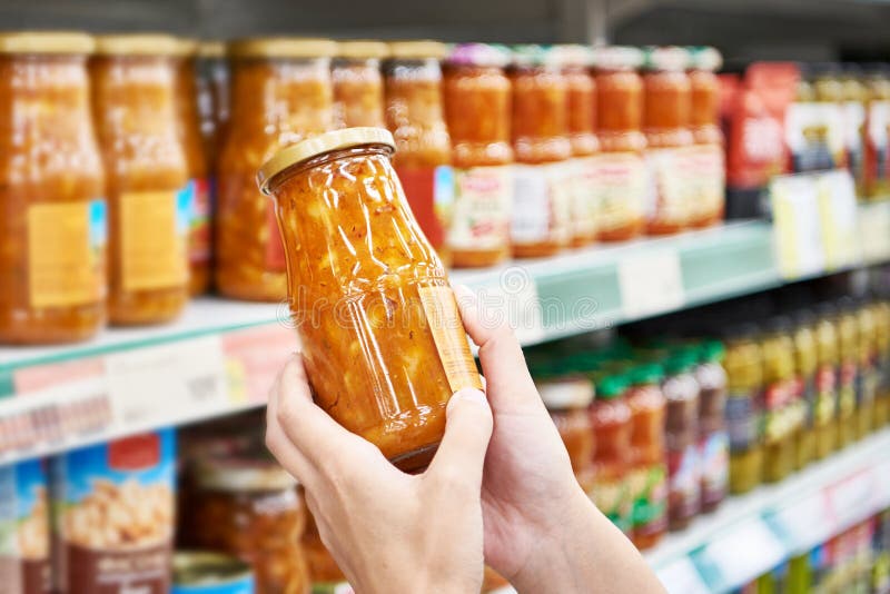 Jar of Beans with Vegetables in Hands in Store Stock Photo Image of