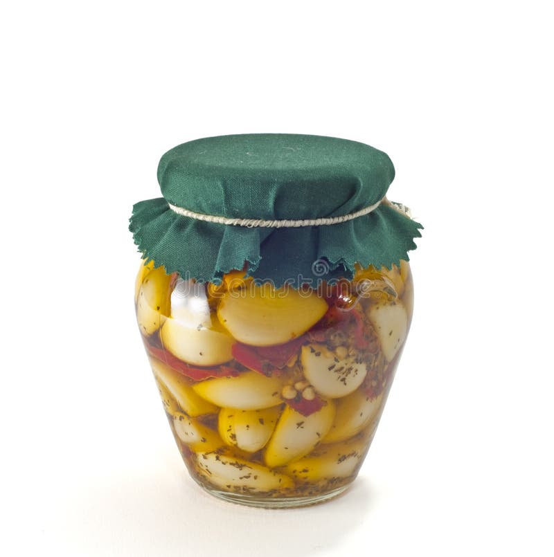 Jar of garlic in oil 1 stock image. Image of diet, olive 16523555