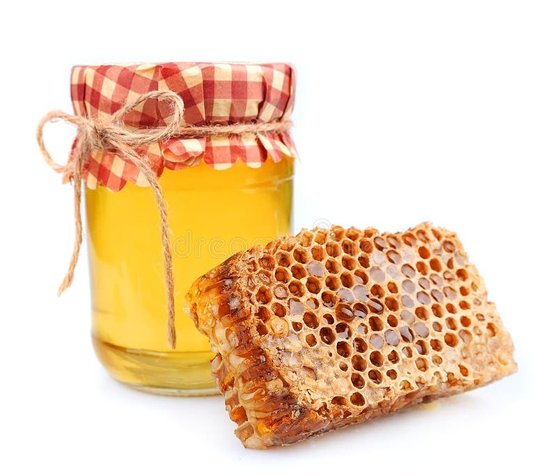 Jar of honey and honey honeycombs