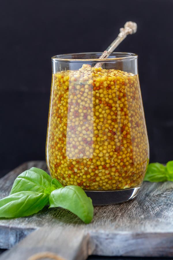 Mustard Sauce in a Glass Jar and Fresh Basil Stock Photo Image of condiment, white 136192694