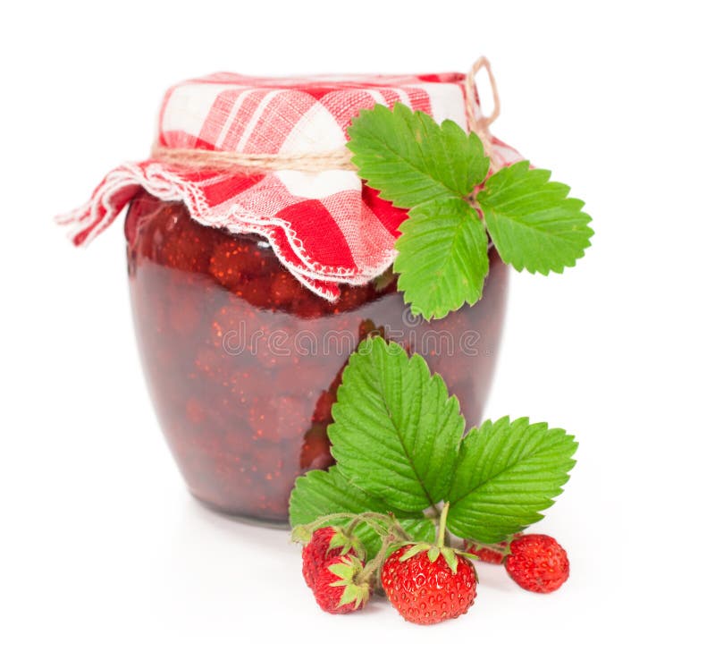 Jar of strawberry jam with fresh berries