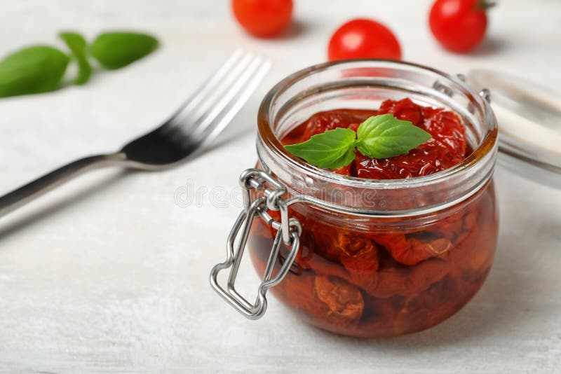 Jar with Sun Dried Tomatoes on Light Table Stock Image Image of