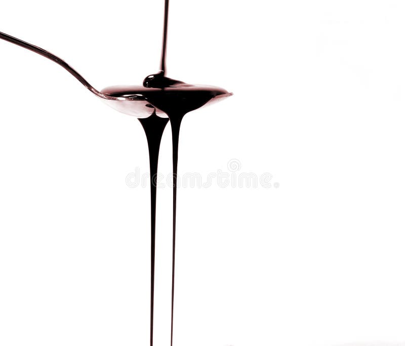 Jarabe de chocolate fotografía de archivo Jarabe de chocolate fotografía de archivo