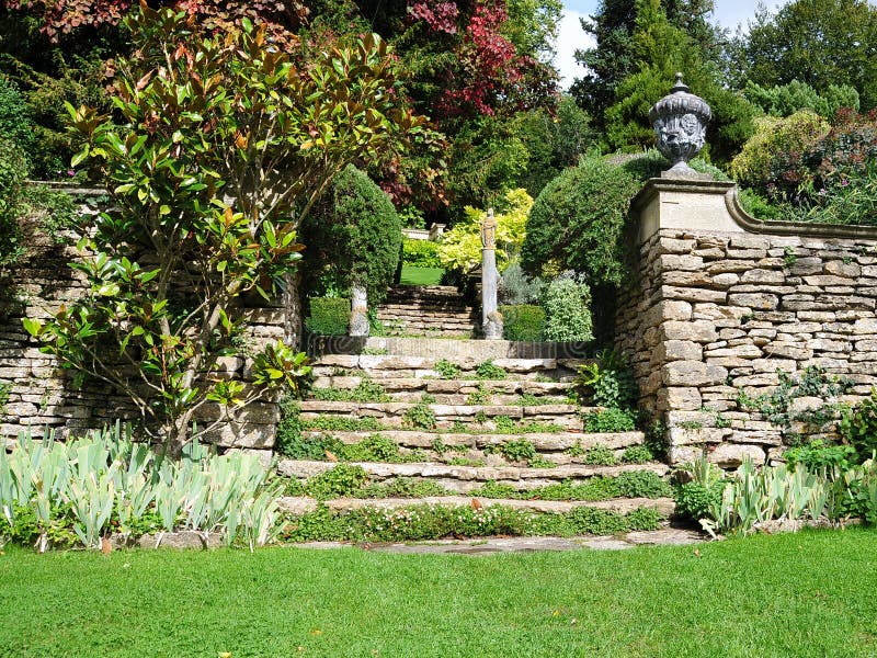 Tranquil Landscape Garden Scene of a Freshly Mown Lawn and Steps to an Upper Level. Tranquil Landscape Garden Scene of a Freshly Mown Lawn and Steps to an Upper Level