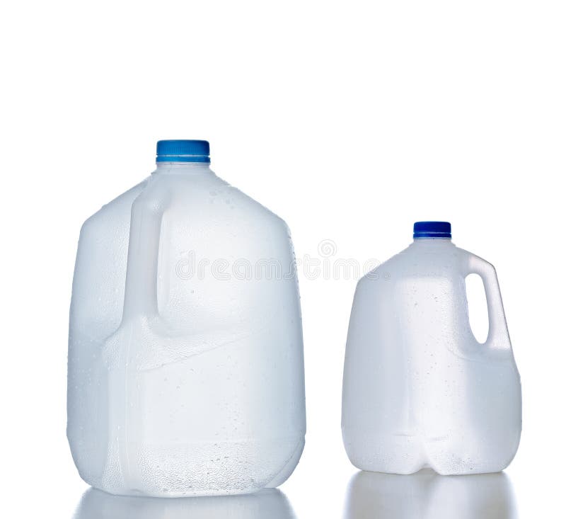 Plastic jugs, pair of recyclable and reusable bottle jugs containers for water, milk and other liquids with no tag and drops on the surface, isolated on white background with reflection. Plastic jugs, pair of recyclable and reusable bottle jugs containers for water, milk and other liquids with no tag and drops on the surface, isolated on white background with reflection