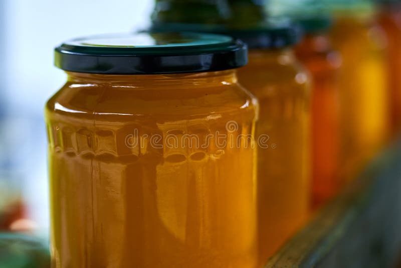 Jars full of honey stock photo. Image of natural, agriculture 193186790