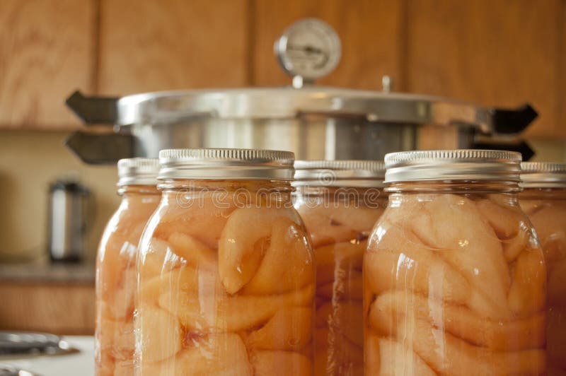 Jars of home canned pears stock image. Image of fruit 21662421