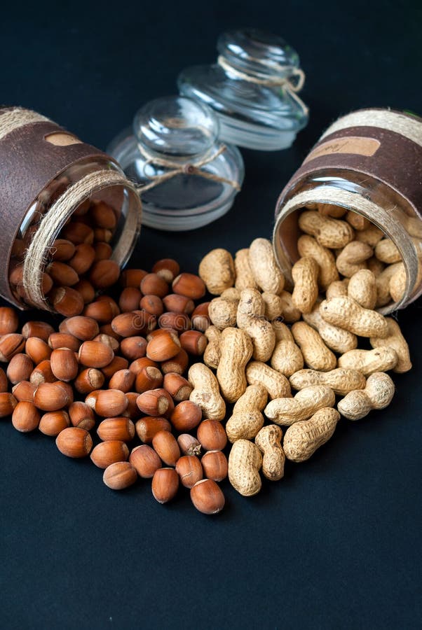 Jars of Peanuts and Hazelnuts Laid Out in the Stock Photo Image of
