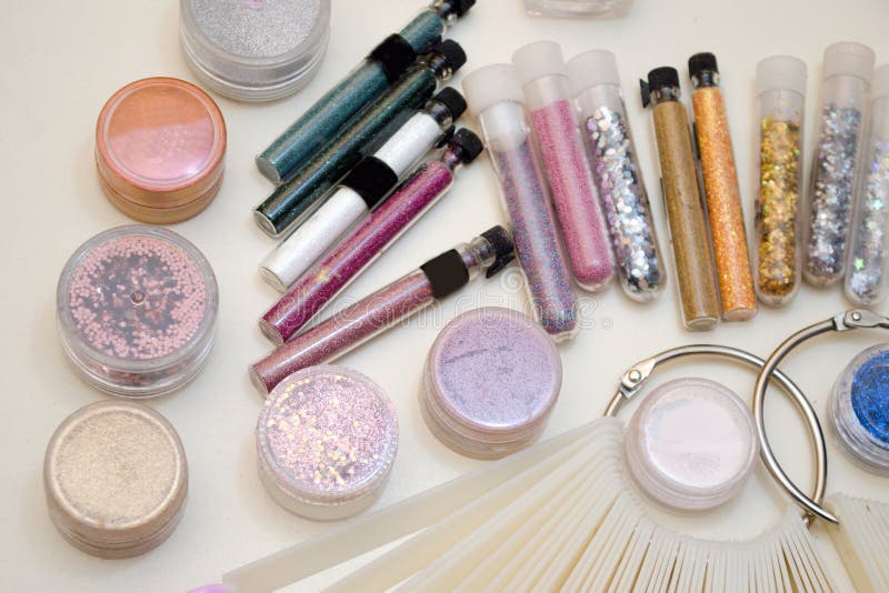 Jars with Sparkles and Decor for Nail Design, Color Samples of Gel Polish on Plastic Tips